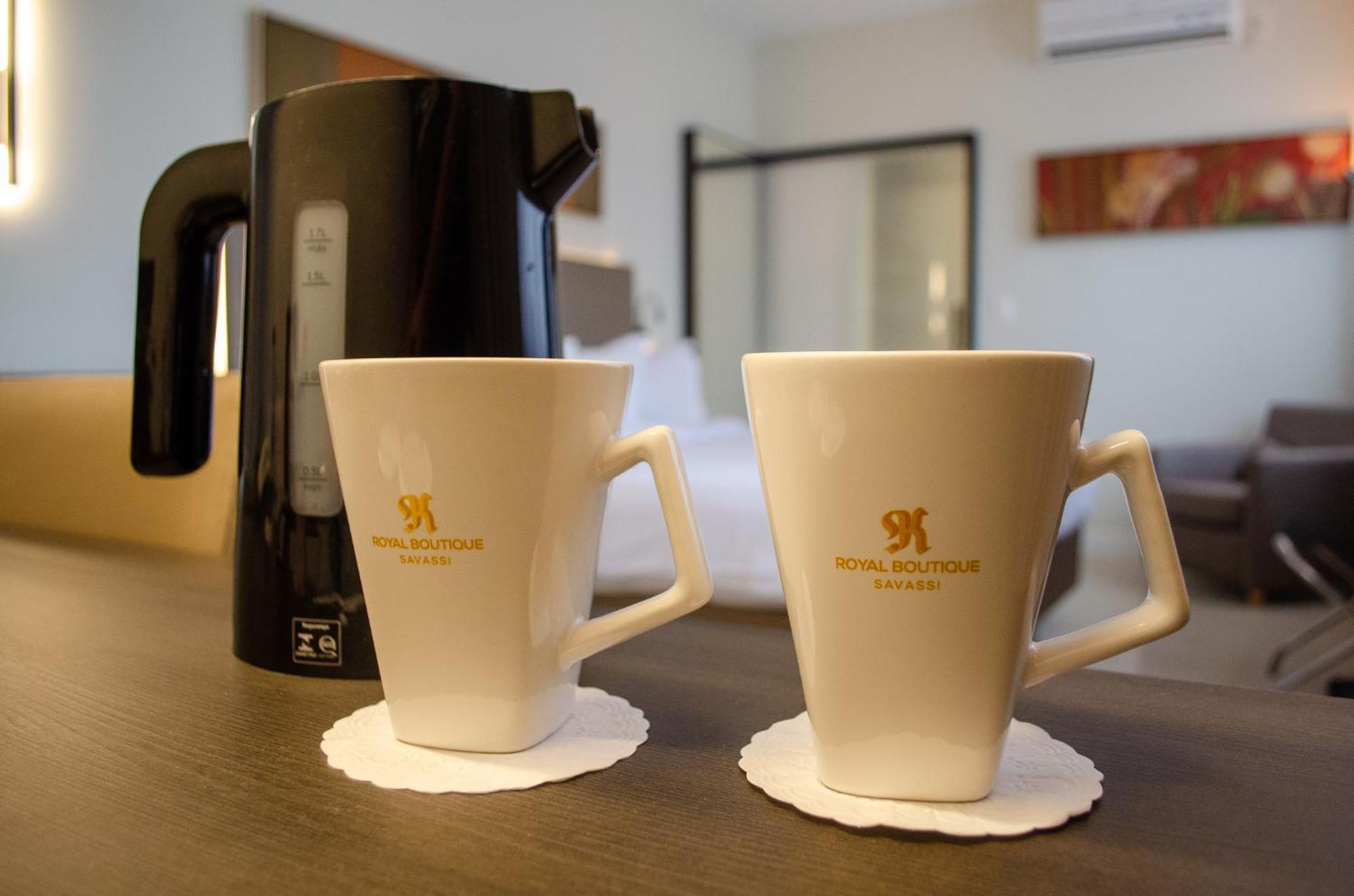 Royal Boutique Savassi Hotel Belo Horizonte Kültér fotó A kettle and two cups