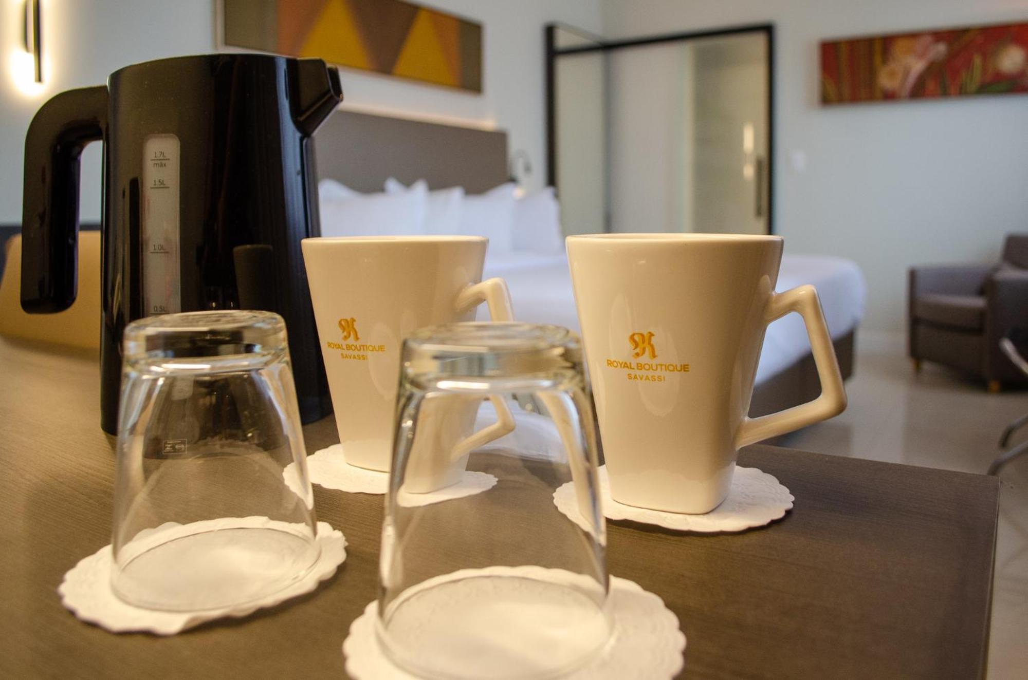 Royal Boutique Savassi Hotel Belo Horizonte Kültér fotó A coffee pot and two cups