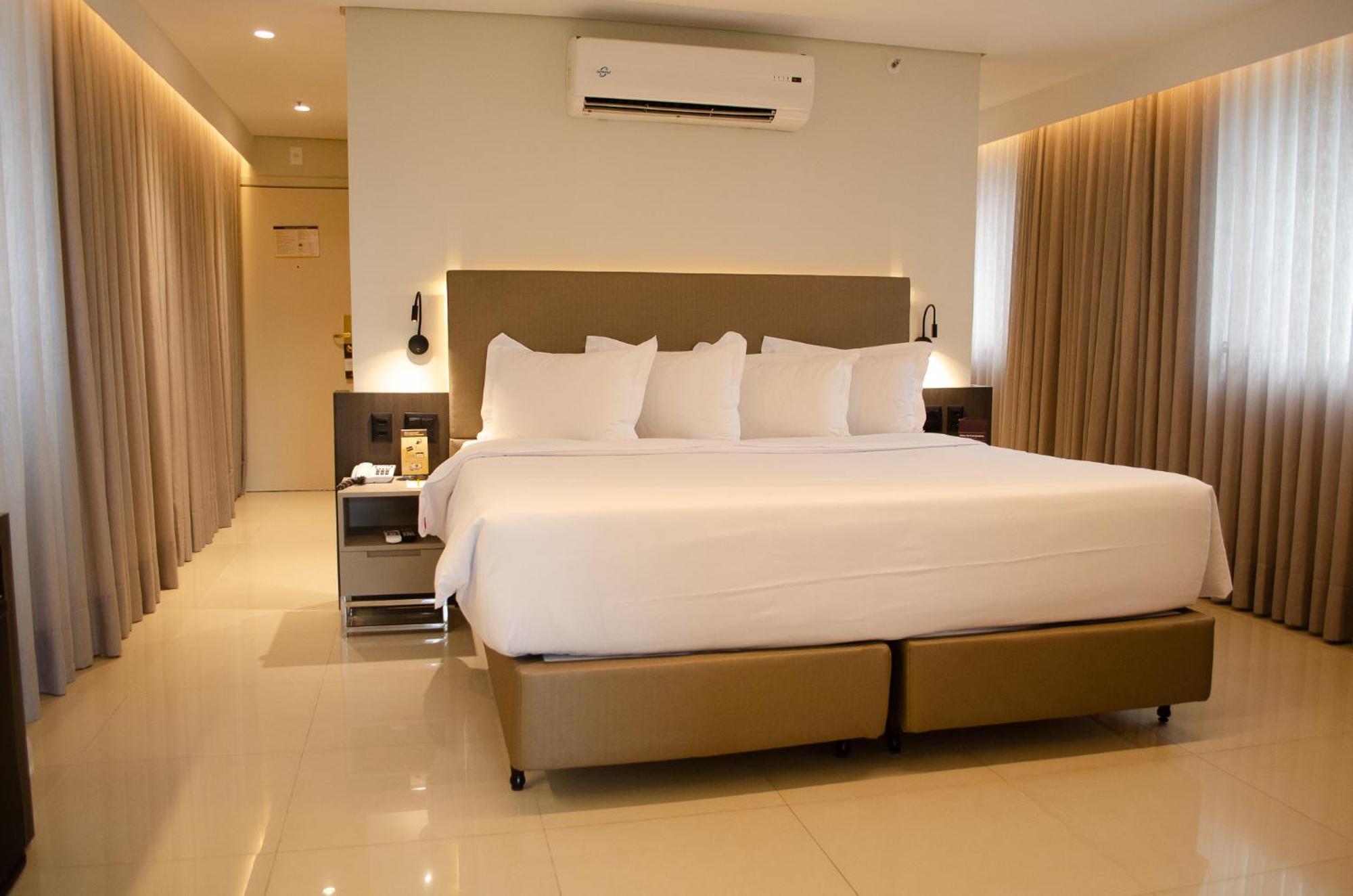 Royal Boutique Savassi Hotel Belo Horizonte Kültér fotó A bedroom at the hotel